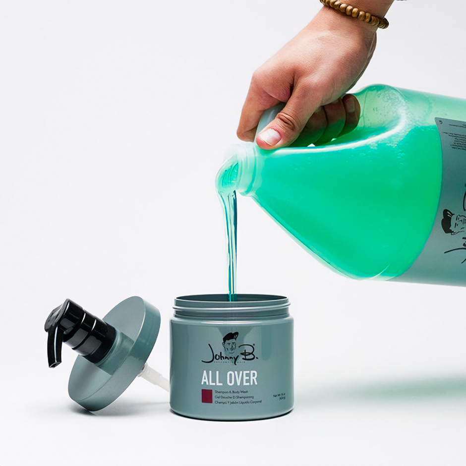 All Over Gallon pouring shampoo into a smaller 16oz jar