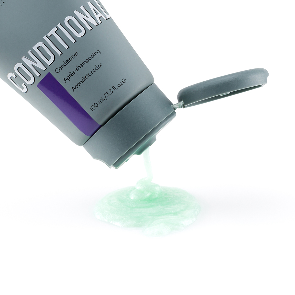 Johnny B. Conditional 100ml tube squeezing out product