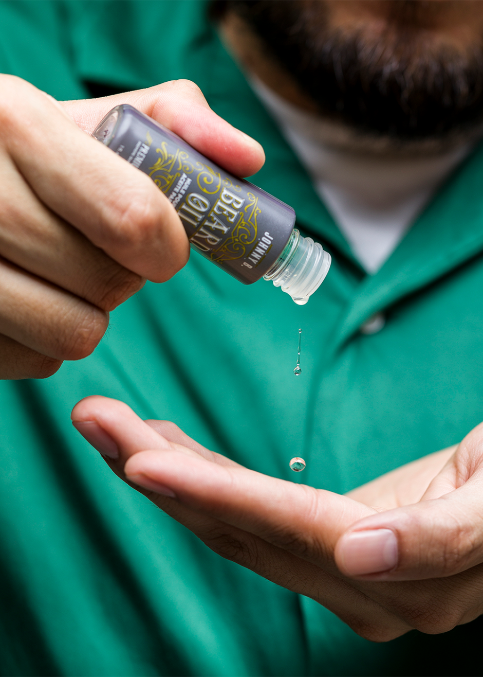 Man applying Beard Oil