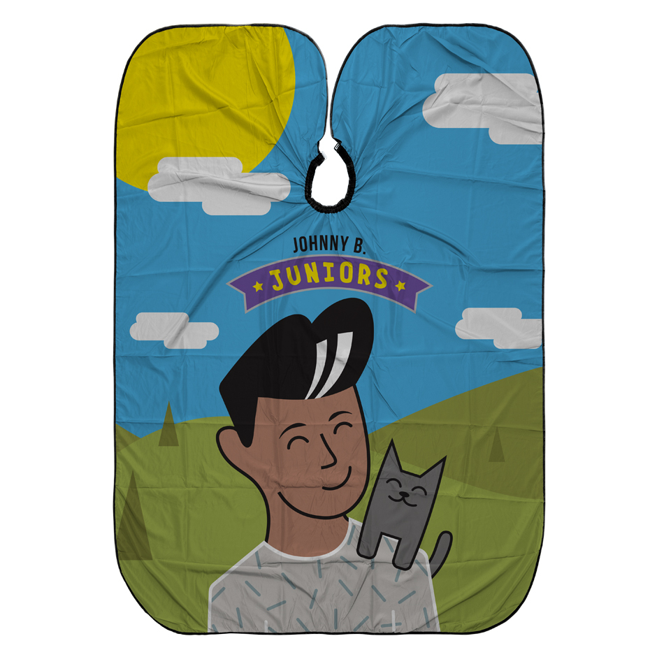 Juniors Cutting Cape. Artwork features a male child with a cat on his shoulder