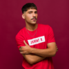 Man wearing red Feelin Good t-shirt
